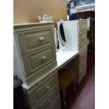 A white melamine twin-pedestal dressing chest, two-drawer bedside chest, dressing stool & triple