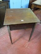 An Edwardian mahogany lidded desk with string inlaid detail