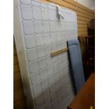 A 4ft6 memory foam mattress with an upholstered headboard