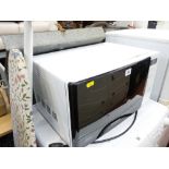 A Samsung microwave oven & ironing board E/T