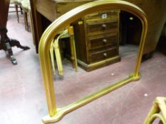 A reproduction gilt framed overmantel mirror