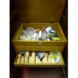 A lightwood lidded sewing trolley & contents