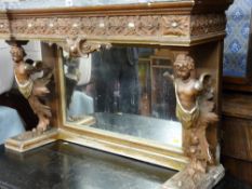 A highly decorative continental mirrored stand having a shaped green marble top over winged cherubic