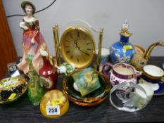 A parcel of decorative items including mantel clock, cabinet cups, paperweights, figurines etc