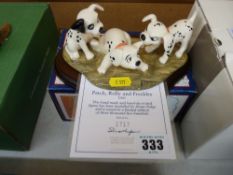 A boxed Royal Doulton Patch, Rolly & Freckles '101 Dalmatians' group on a wooden base with
