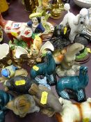 A Staffordshire cow creamer, three Poole pottery figurines & other animal related collectables