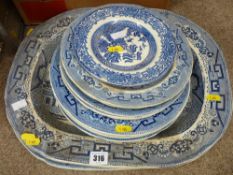 Two blue & white meat platters and a quantity of other dresser plates