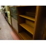 A teak glass fronted bookcase