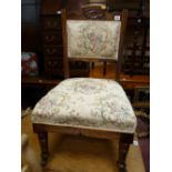 An Edwardian upholstered salon chair