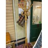 A bamboo coat & hat stand together with a reproduction magazine rack