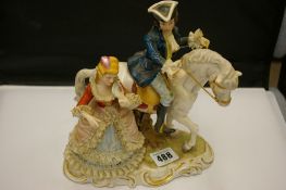 Continental figure of a gentleman on horseback with lady