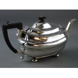 A HEAVY OVAL SILVER TEAPOT on four ball feet, 23 troy ozs gross, London 1927