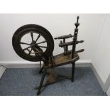 AN ANTIQUE SPINNING WHEEL, 90 cms wide overall (as seen)