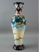 A MOORCROFT POTTERY VASE, unknown design by Anji Davenport of a dove and bees amongst blossom