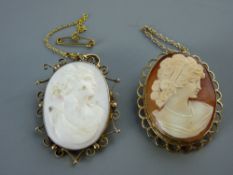 A NINE CARAT GOLD OVAL CAMEO BROOCH in a looped type frame, with safety chain and a nine carat