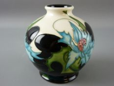 A MOORCROFT 'SEA KALE' CREAM GROUND GLOBULAR VASE, 11 cms high