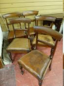 A SET OF FIVE VICTORIAN MAHOGANY DINING CHAIRS with curved top rails and turned front supports