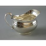 AN OVAL SILVER MILK JUG, 6.2 troy ozs, Sheffield 1934