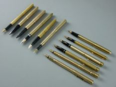 TWELVE GOLD & GOLD COLOURED VINTAGE FOUNTAIN PENS, including a Mabie Todd & Co Swan nine carat