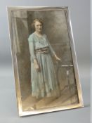 A PLAIN SILVER EASEL PICTURE FRAME to take a picture 18 x 30 cms, Birmingham 1926