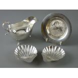 A PARCEL OF SILVER to include a Sheffield 1945 sauce boat by Walker & Hall, 3.6 troy ozs, a pair