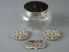 A SILVER BUCKLE, a two piece nurse's buckle and a silver and tortoiseshell lidded dressing table
