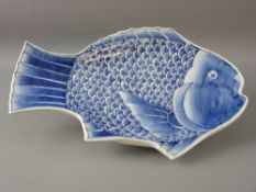 A JAPANESE IMARI SOMETSUKE WARE FISH PLATTER in underglazed hand painted blue and white palette,