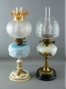 TWO VICTORIAN OIL LAMPS, one with brass column, milk glass sunset decorated reservoir and clear