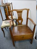 AN ANTIQUE OAK FARMHOUSE ELBOW CHAIR with centre shaped splat and a pair of Edwardian mahogany and