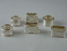 TWO PAIRS OF SILVER NAPKIN RINGS and two singles, 4.8 troy ozs