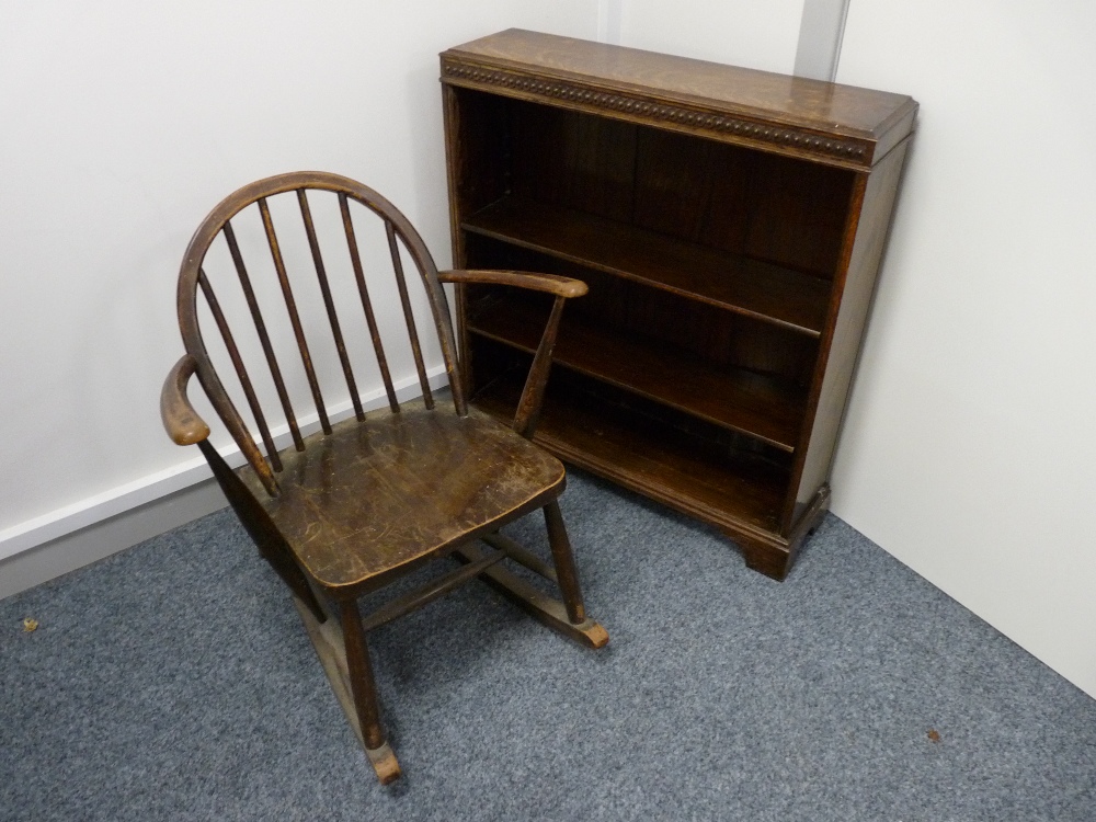 A NEAT POLISHED OPEN BOOKCASE with adjustable shelves, 77 cms wide and an Ercol rocking chair