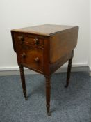 AN EARLY VICTORIAN MAHOGANY WORK TABLE, the twin flap top with moulded edge over one shallow and one