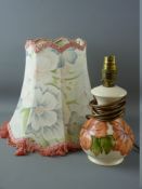 A MOORCROFT 'CORAL HIBISCUS' TABLE LAMP decorated on an ivory ground with cloth covered floral