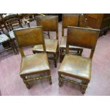 A SET OF FOUR OAK DINING CHAIRS with rexine covered backs and seats on turned front supports