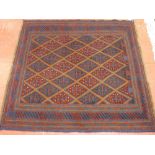 A TRIBAL CAZAK RUG, blue and red ground with repeating central diamond pattern and multi-bordered