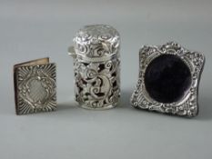 THREE ITEMS OF SMALL SILVER including an ornately covered ruby glass salts bottle with hinged lid (
