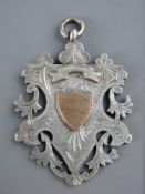 A LARGE SILVER TROPHY PENDANT, dated and initialled to the rear, 25 grms