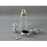 A THREE PIECE ELECTROPLATED CONDIMENT SET and a glass sugar shaker with a domed electroplated top