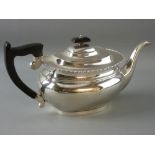 A SUBSTANTIAL OVAL SILVER TEAPOT with bead edging, composition handle and knopped lid, 25 troy ozs