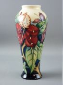 A MOORCROFT 'SIMEON' TALL BALUSTER VASE by Gibson, 20.5 cms high