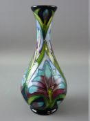 A MOORCROFT 'CLEOPATRA' VASE, designed by Sian Leeper, decorated on a cobalt ground, impressed and