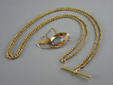 A NINE CARAT GOLD MODERN ABSTRACT STYLE BROOCH with large oval opal and safety chain, 7 grms and a