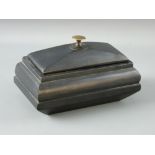 A WELSH SLATE FORK ART piece in the form of a lidded casket with brass knob to the lid, 10 cms