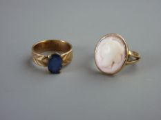 A NINE CARAT GOLD OVAL CAMEO RING and a nine carat gold blue stone ring, total 7 grms