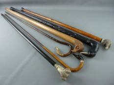 SIX VINTAGE WALKING STICKS & CANES with animal or bird head handles including a carved ebony cane,
