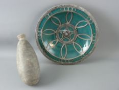 A POTTERY BOTTLE FROM ANTIQUITY and a possibly Persian shallow dish with metal mounts, the suggested