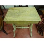 A VICTORIAN LIMED WALNUT WORK TABLE, the rectangular top with central inlaid oval panel opening to