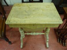 A VICTORIAN LIMED WALNUT WORK TABLE, the rectangular top with central inlaid oval panel opening to