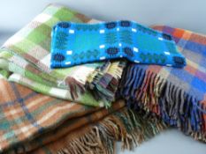 THREE QUALITY WELSH WOOL BLANKETS, tassel ended in colourful check patterns and a traditional