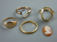 AN UNMARKED GOLD DRESS RING with small oval opal, 2.9 grms, a nine carat gold dress ring with oval